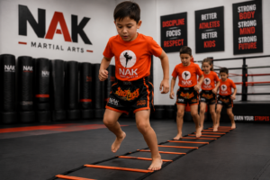 Child performing footwork or movement drills.